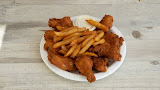 Chicken tenders with fries on a plate